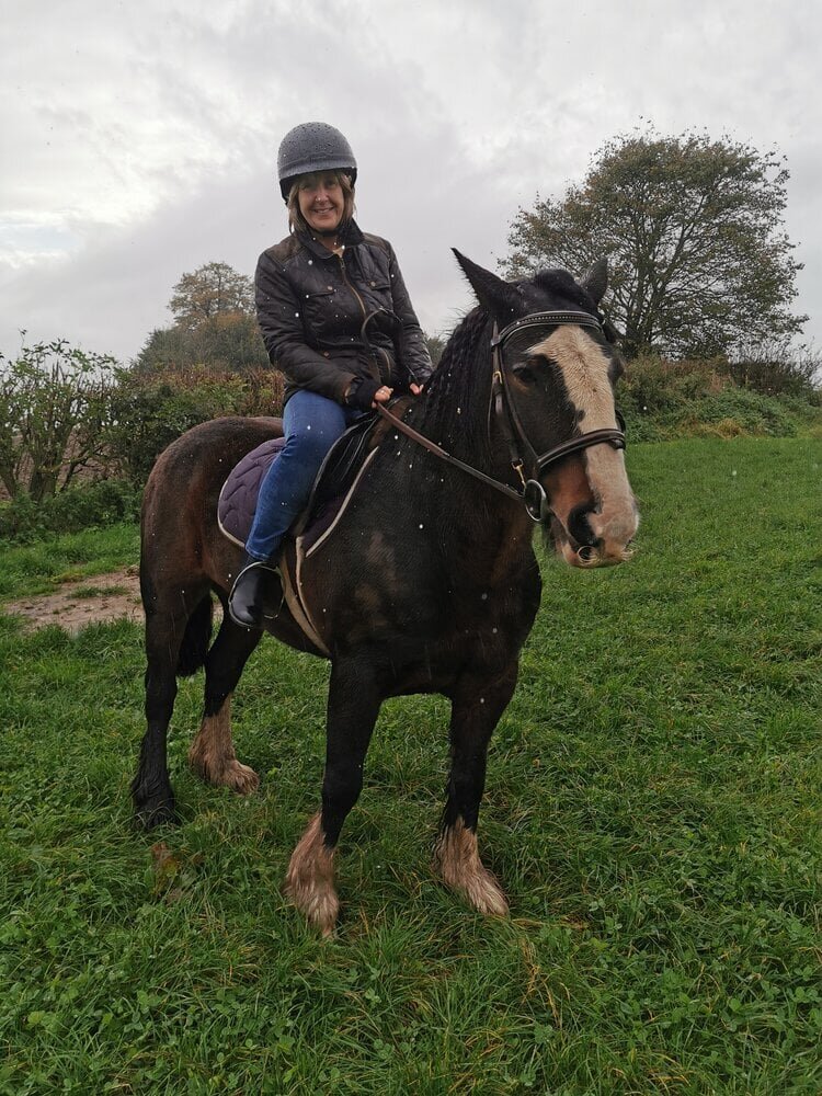 woman-riding-a-horse.jpeg